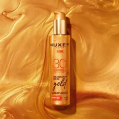 Nuxe Sun, rozświetlający olejek do opalania twarzy i ciała z drobinkami, SPF30, 150 ml